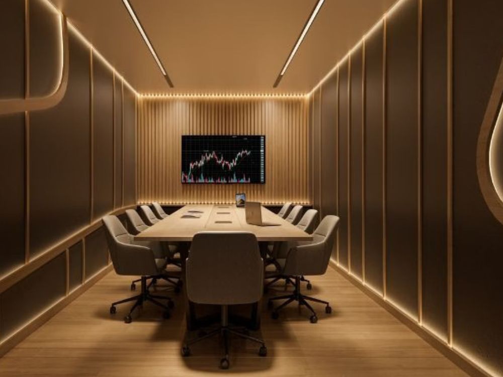 Sala de reunião corporativa com design moderno e iluminação indireta, ambiente estratégico ao investir em sala comercial